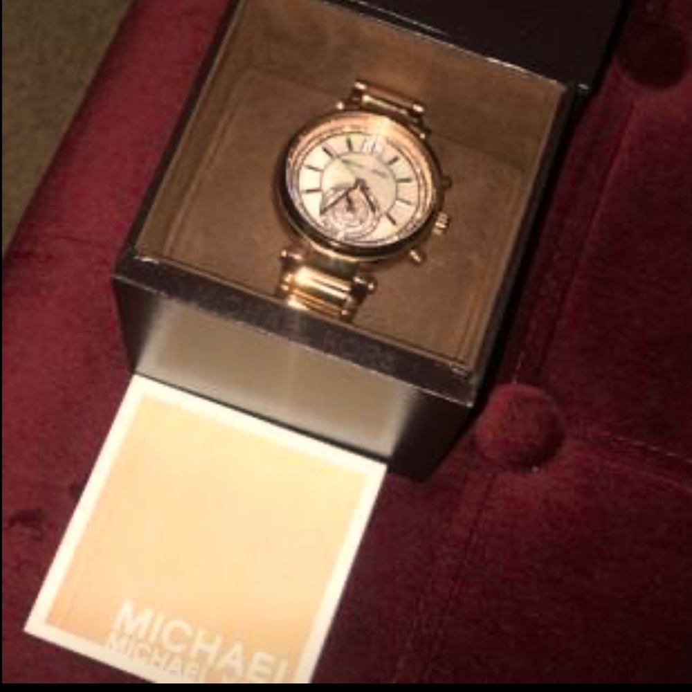 MK rose gold watch